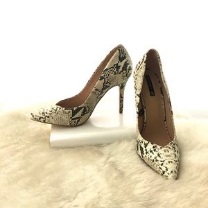 NWOT— Genuine leather Animal print pumps